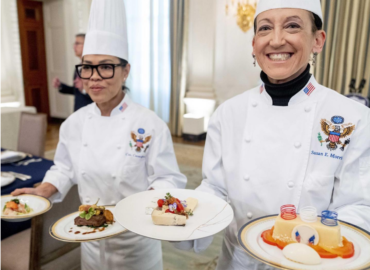 White House chefs present dishes for presidential menu, including cheese.